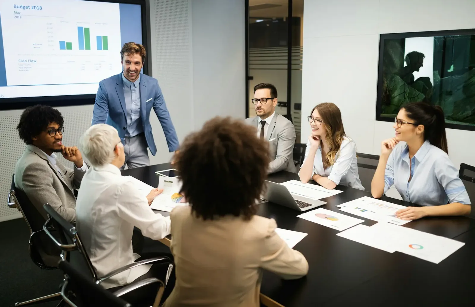 Diverse Business Team in a Strategic Meeting Analyzing Financial Data